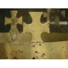 Cross on a metal crown